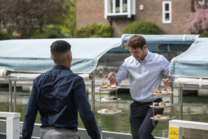 Afternoon tea stands on a boat